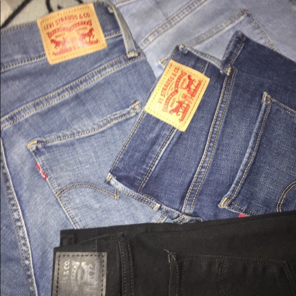 four pairs of women’s levi’s